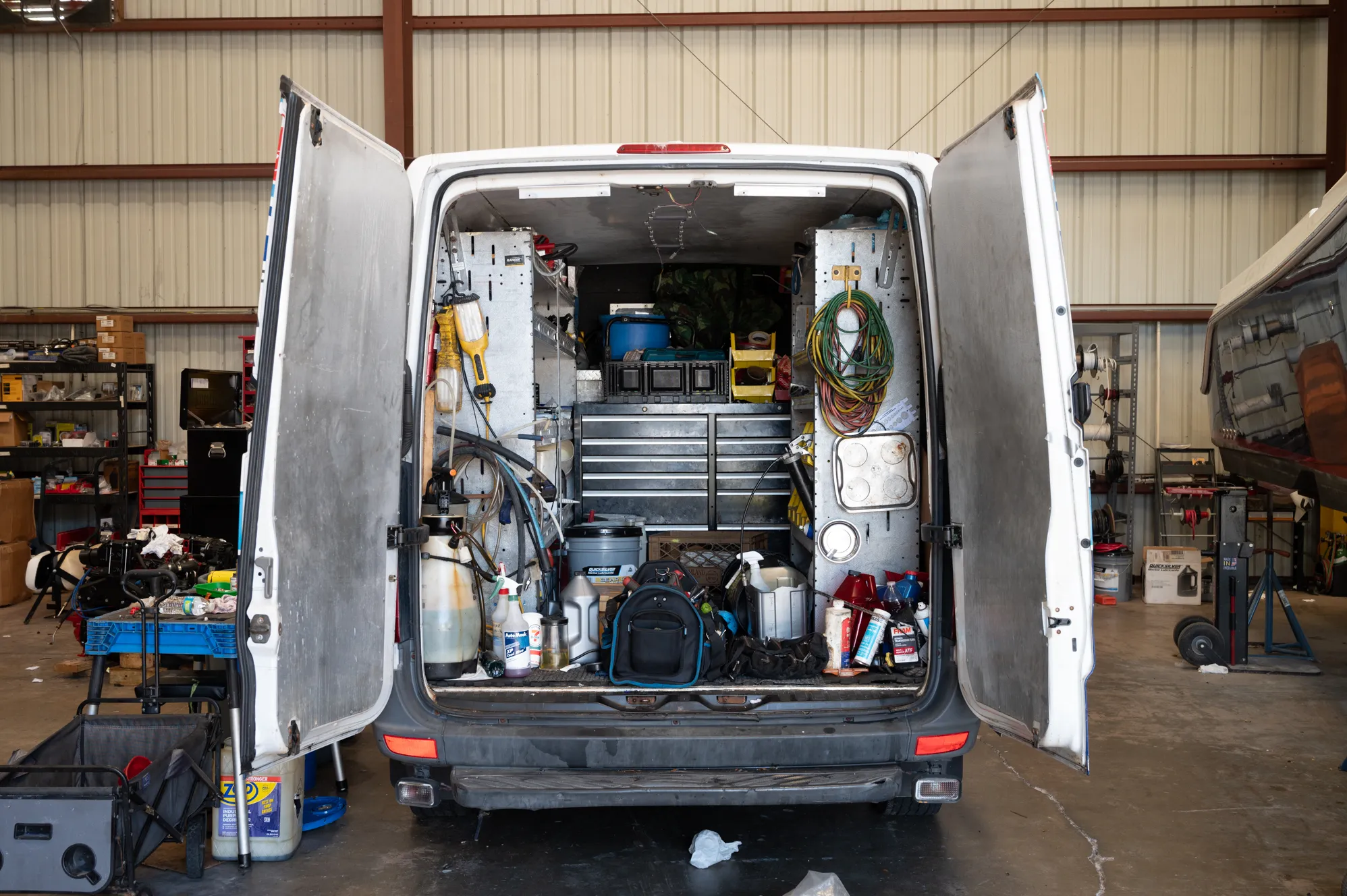Inside a Boat Guys mobile repair van packed with equipment