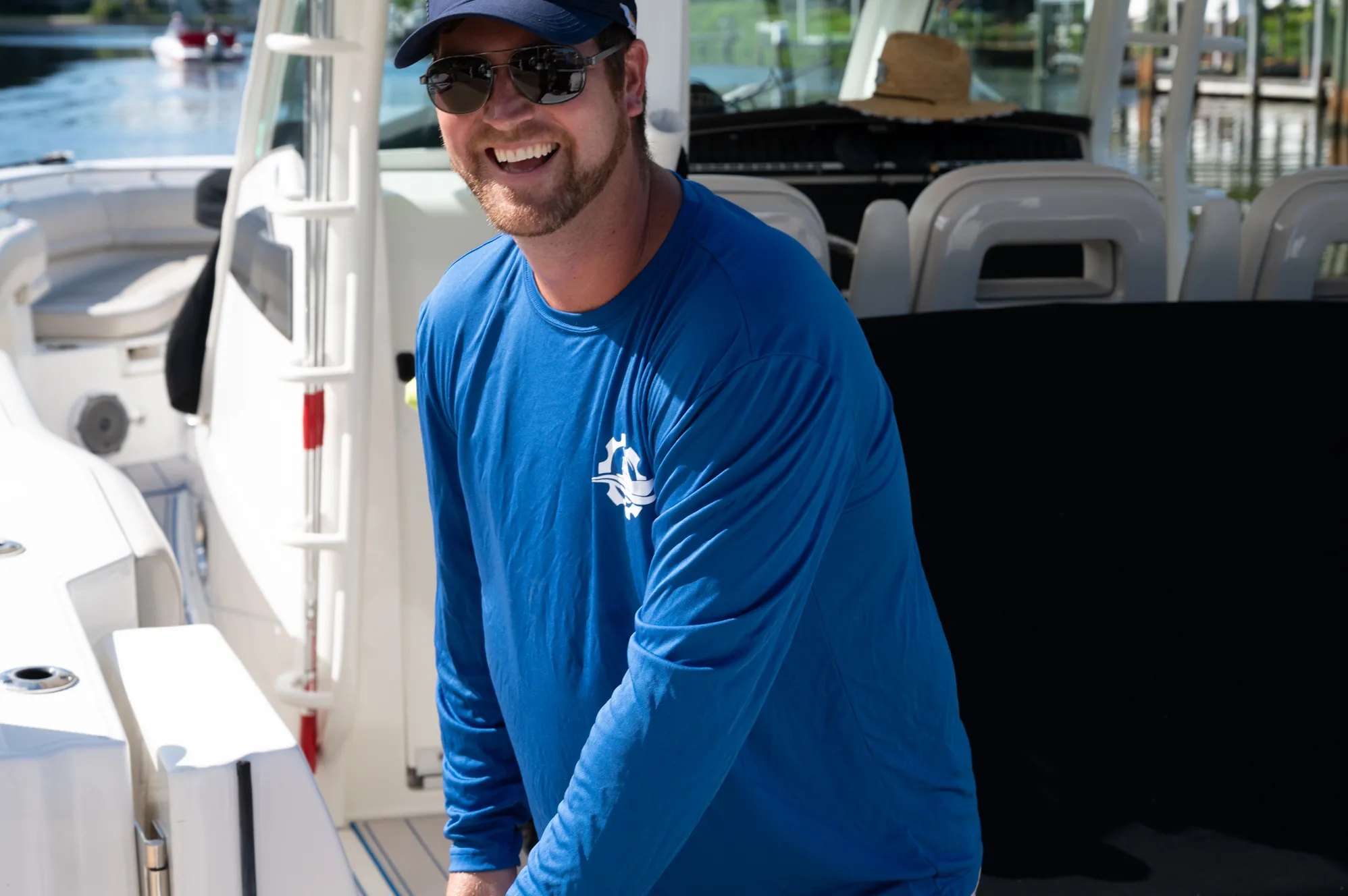 Smiling Boat Guys technician aboard a customer’s boat
