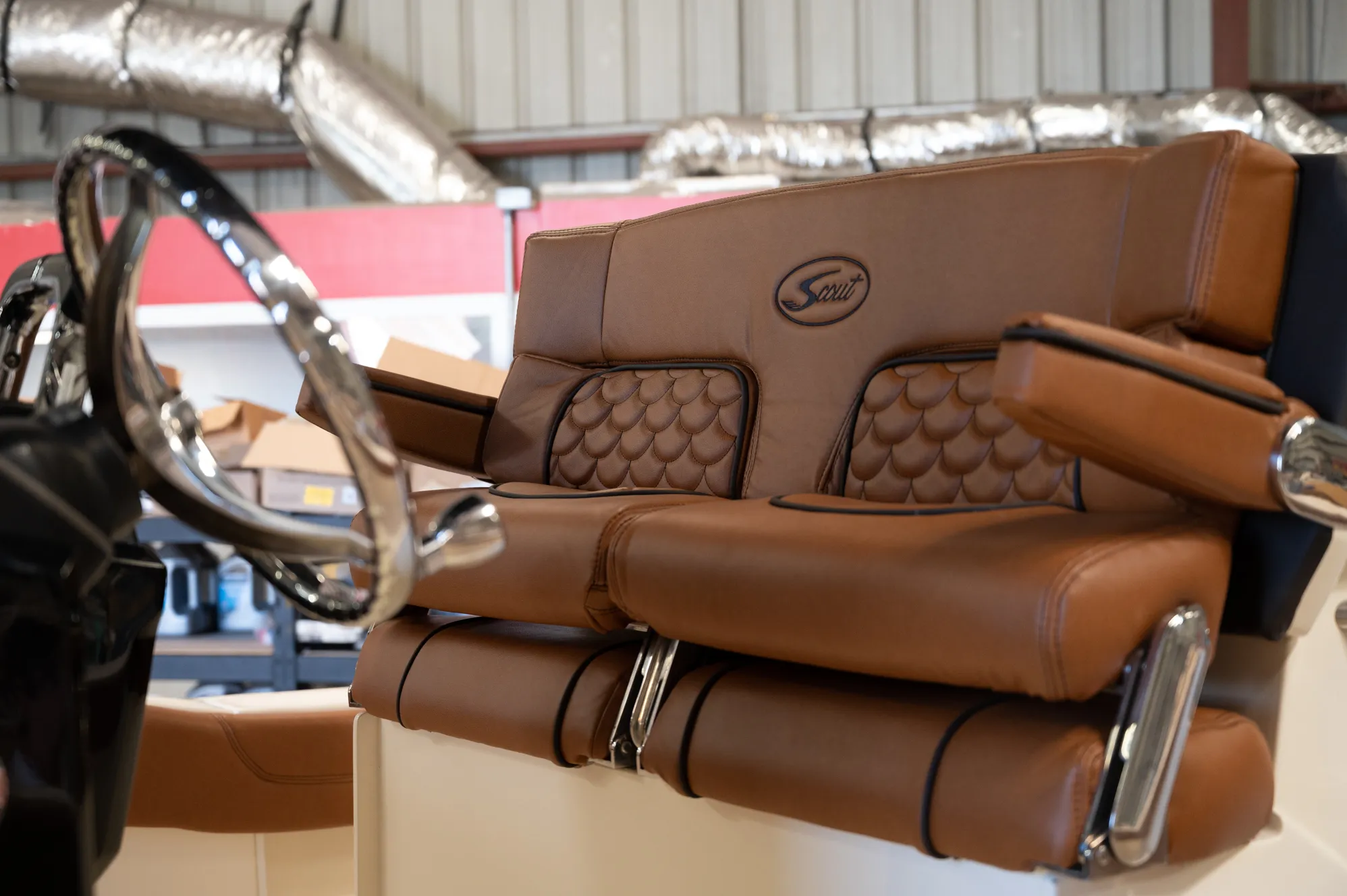 Freshly reupholstered helm seats ready to install