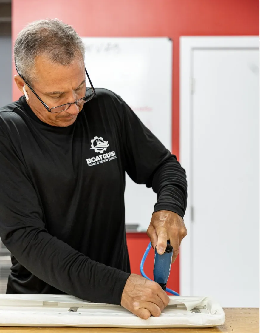 Cutting new marine upholstery in the Boat Guys canvas shop